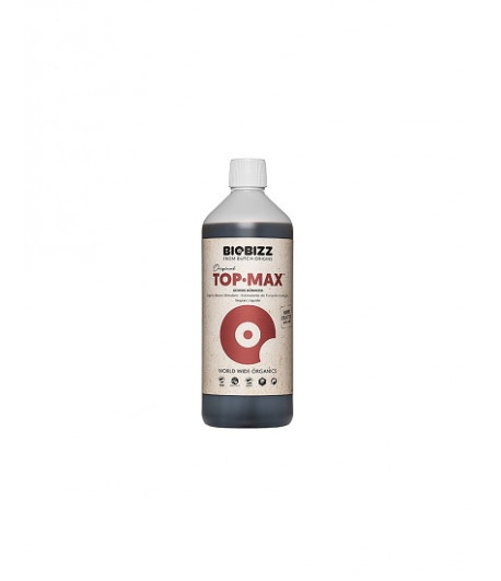 Botella de fertilizante Top Max, para el ciclo floral de las plantas.